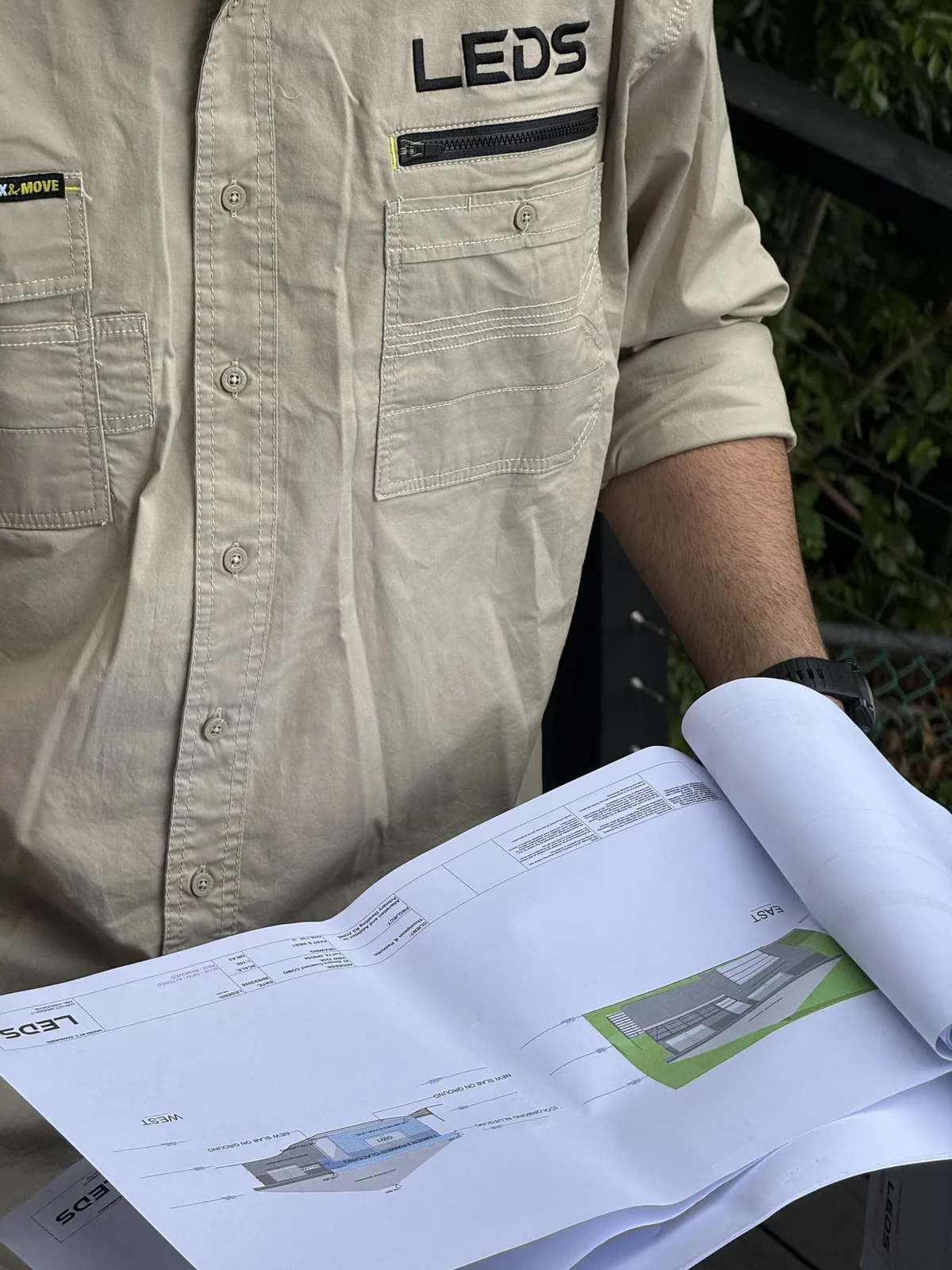 Construction plans open on site