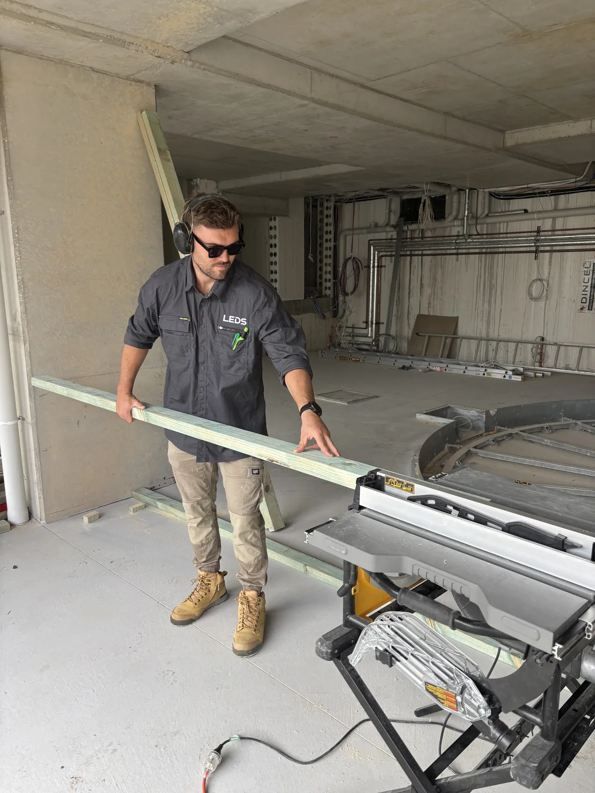 Measuring timber at the saw bench