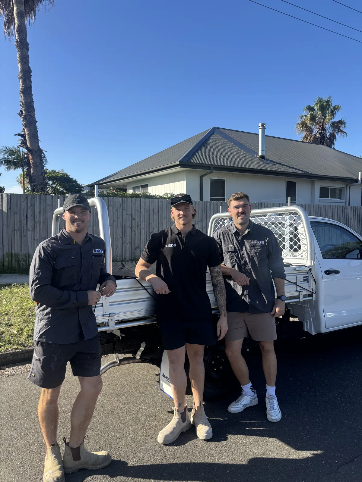 Crew on site beside a LEDS ute