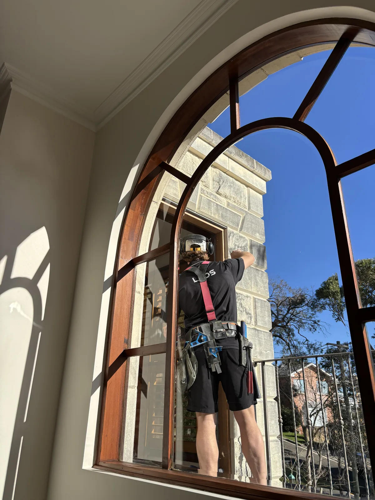 Fitting an arched timber window