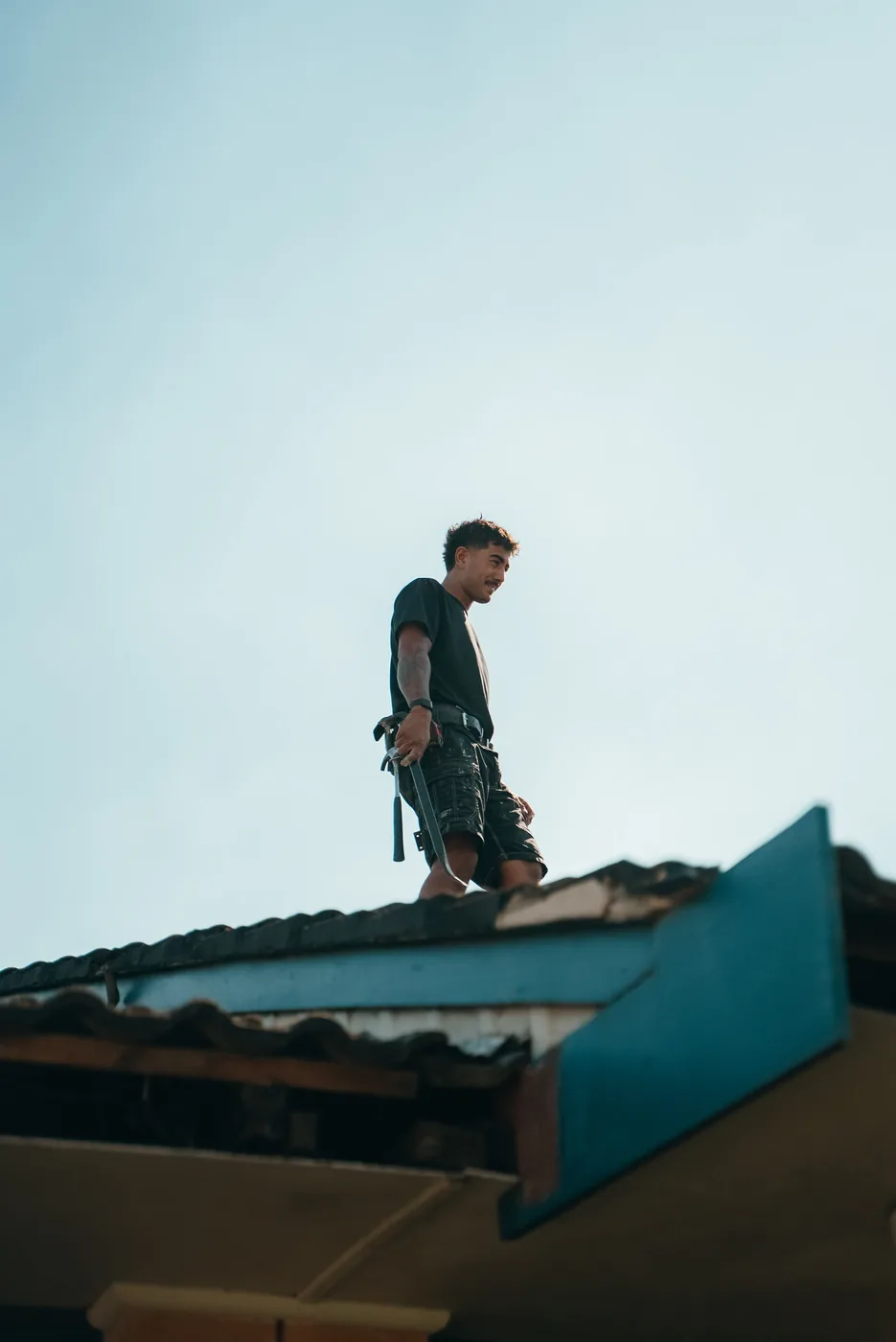 Carpenter standing on a roof frame